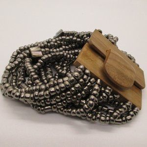 SILVER AND GREY STRETCH SEED BEAD BRACELET WITH UNIQUE WOODEN BUCKLE CLOSURE